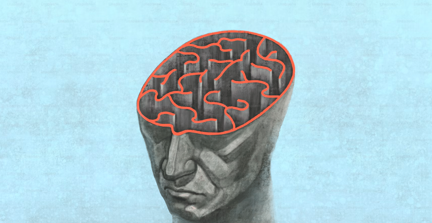 The image is a conceptual stock illustration by Jorm Sangsorn titled Brain Think Psychology Mind Maze Concept, depicting a human head with an open skull containing a red-lined labyrinth instead of a brain.