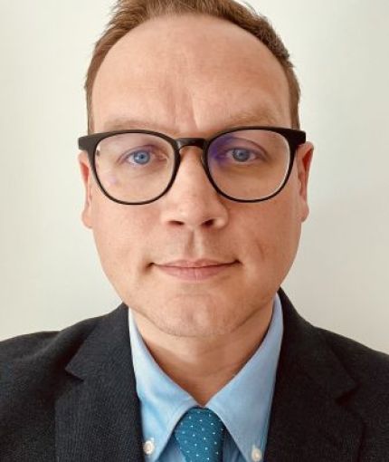 An image of myself in a suit and tie.