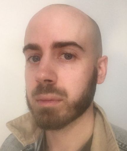 picture of Theo Bourgeron, bald marxist with chestnut beard