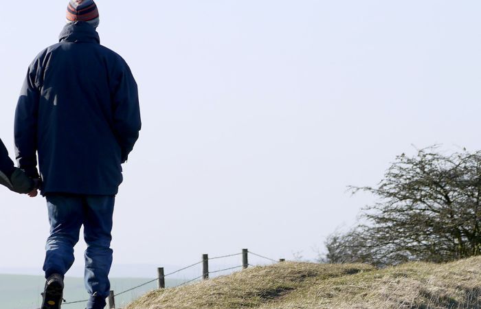Father and son walking together