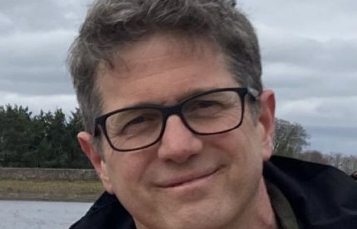 a handsome portrait of Lawrence Dritsas